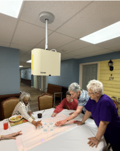 Knollwood residents enjoy fun and connection with the Magic Table.