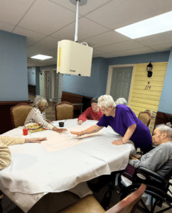 Knollwood residents enjoy fun and connection with the Magic Table.
