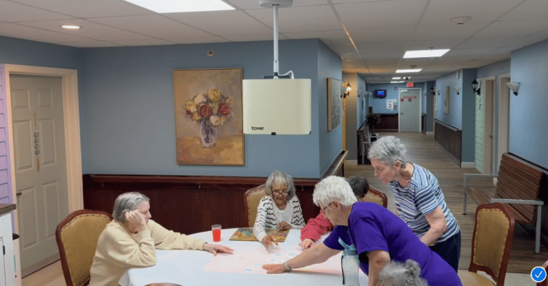 Knollwood residents enjoy fun and connection with the Magic Table.